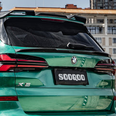 SOOQOO BMW X5 G05 carbon fibre spoiler - rear three-quarter view