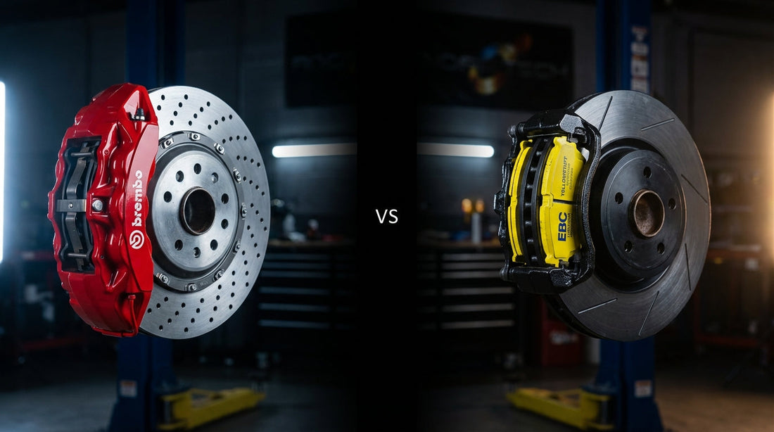 A side-by-side comparison of Brembo and EBC high-performance brake calipers and rotors in a professional automotive setting.