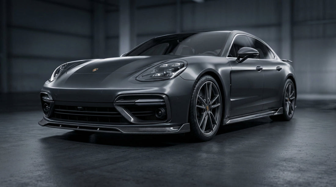 Dark grey Porsche Panamera 971.2 with CMST dry carbon-fibre front lip, side skirts and rear lip in a studio