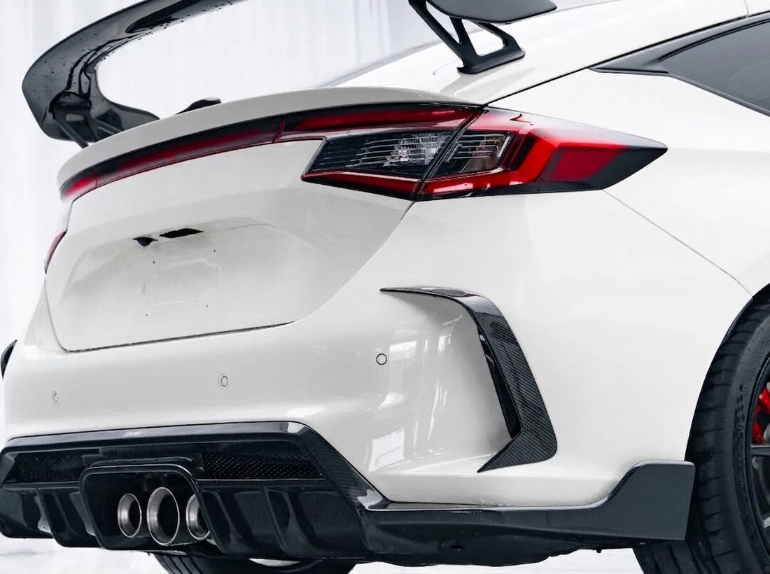 White Honda Civic Type R FL5 wearing the CMST dry-carbon aero kit with carbon bonnet, front lip and rear wing, front three-quarter low angle