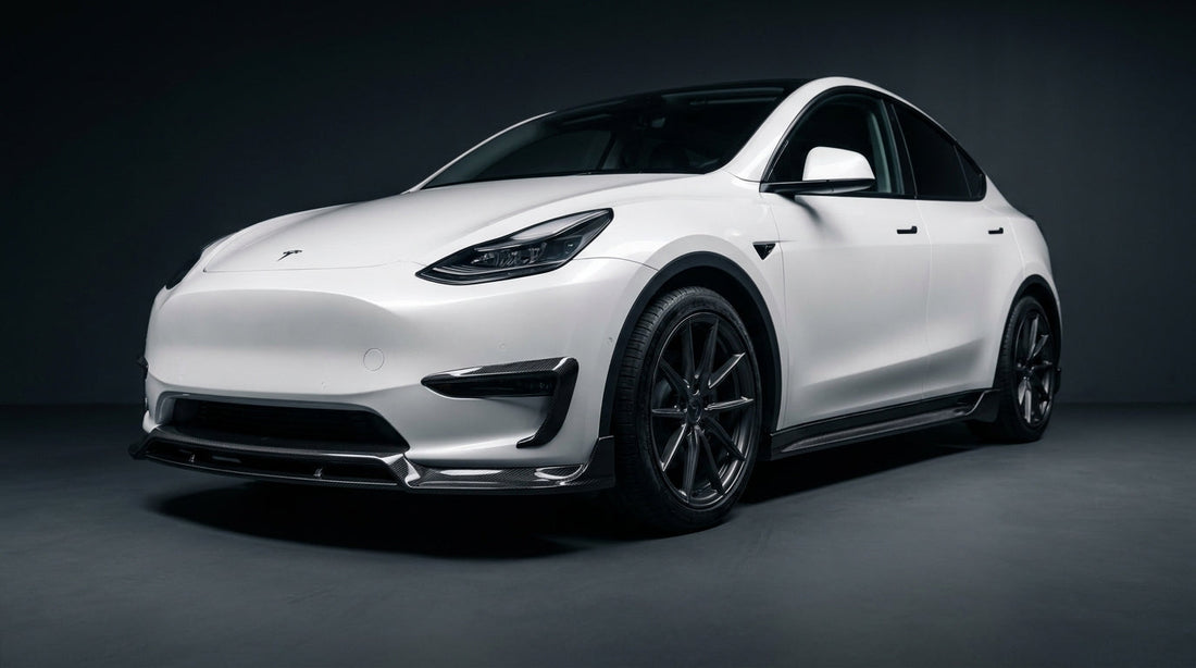 Tesla Model Y with CMST carbon fibre front lip and side skirts, studio photography, 3/4 front low angle