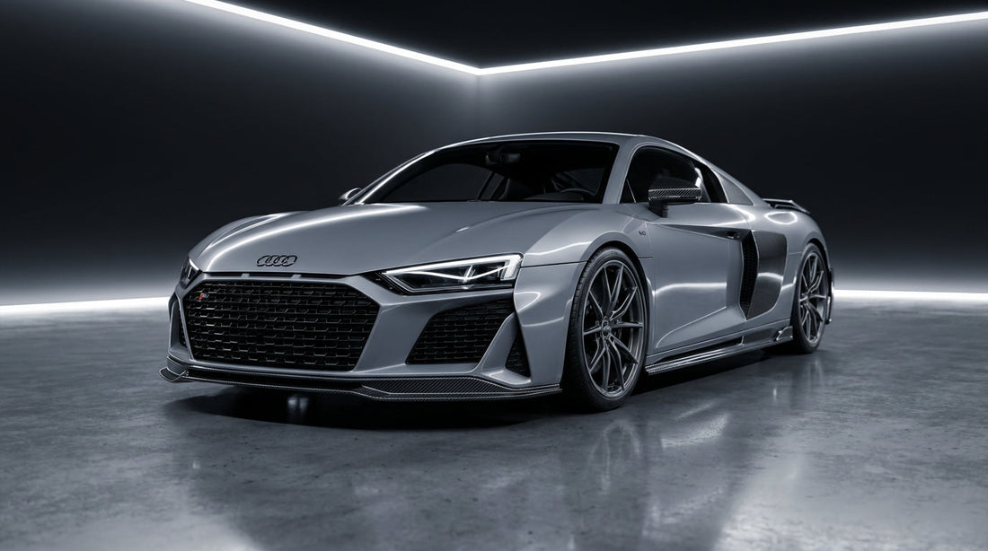Audi R8 V10 in Suzuka Grey fitted with a CMST dry carbon fibre aero kit, front three-quarter low angle in a studio