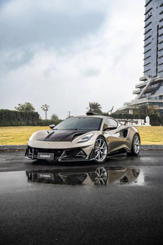 Champagne Lotus Emira with full CMST dry carbon aero kit, low front three-quarter hero
