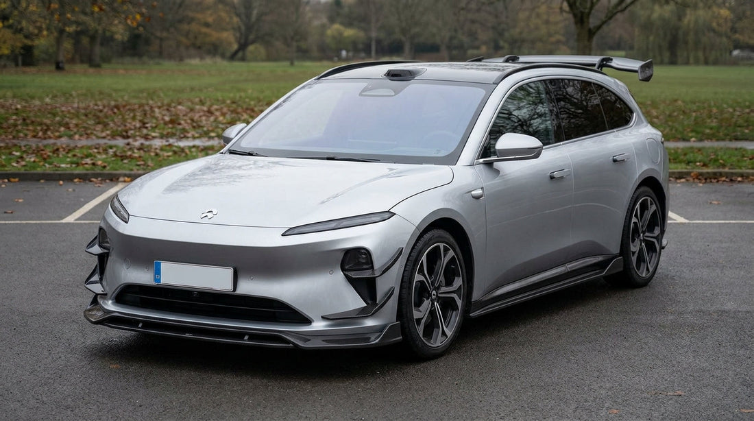 NIO ET5T wagon with carbon fibre front lip, side skirts and rear spoiler installed, 3/4 front low angle view