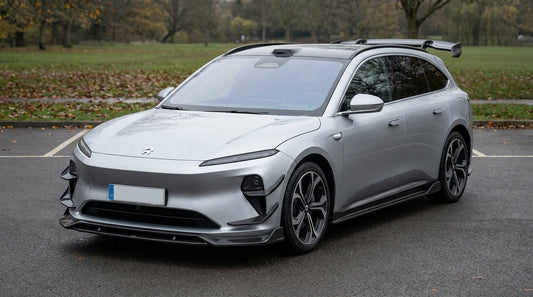 NIO ET5T wagon with carbon fibre front lip, side skirts and rear spoiler installed, 3/4 front low angle view