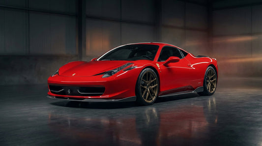 Red Ferrari 458 Italia with the subtle CMST carbon-fibre kit, front three-quarter low angle showing carbon front lip and splitter