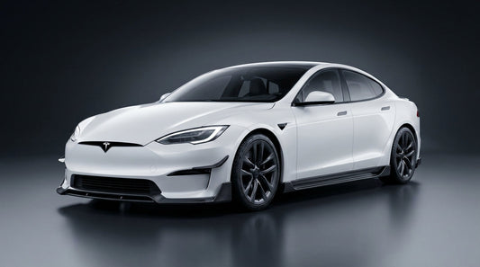 White 2023 Tesla Model S fitted with a CMST dry carbon fibre front lip, side skirts and rear diffuser, 3/4 front low angle in a studio