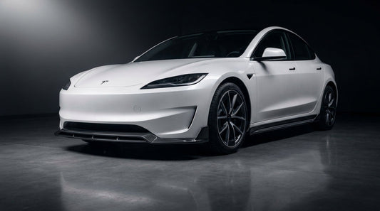 2025 Tesla Model 3 Performance in white with a CMST carbon fibre front lip and side skirts, 3/4 front low angle in a studio