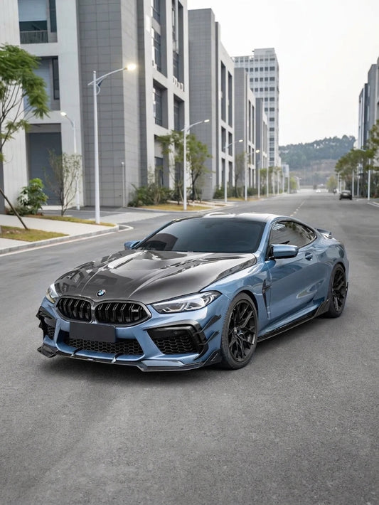 BMW M8 Competition in Marina Bay Blue with full CMST carbon fibre kit and carbon bonnet, low front three-quarter hero