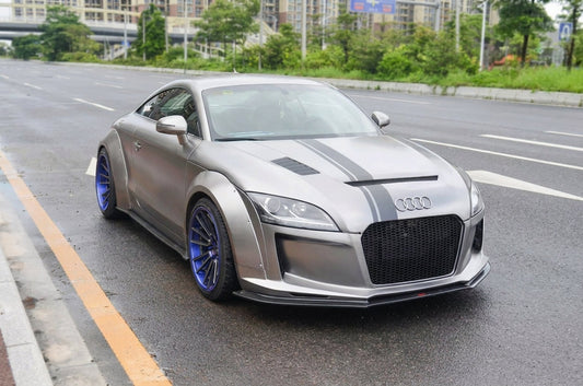Silver Audi TT with CMST widebody kit and deep-dish two-piece forged wheels, three-quarter front low angle