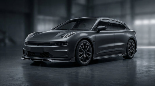 2024 Zeekr 001 in dark grey with CMST dry carbon fibre body kit, front lip, canards, and side skirts visible, workshop lighting