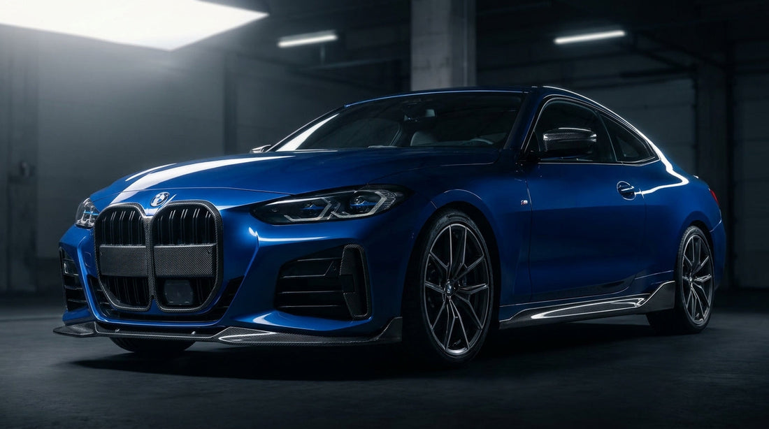 Blue BMW 4 Series G22 coupe with CMST carbon front lip and rear lip, low front three-quarter studio shot