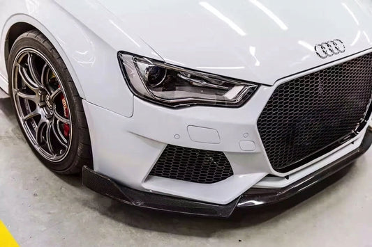 White Audi S3 with CMST big-mouth front bumper and carbon lip, three-quarter front low angle