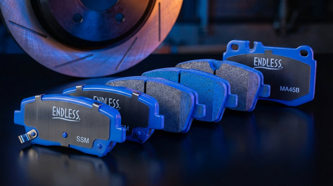 A comprehensive lineup of Endless blue brake pads showing various compounds from street SSM to professional racing MA45B.