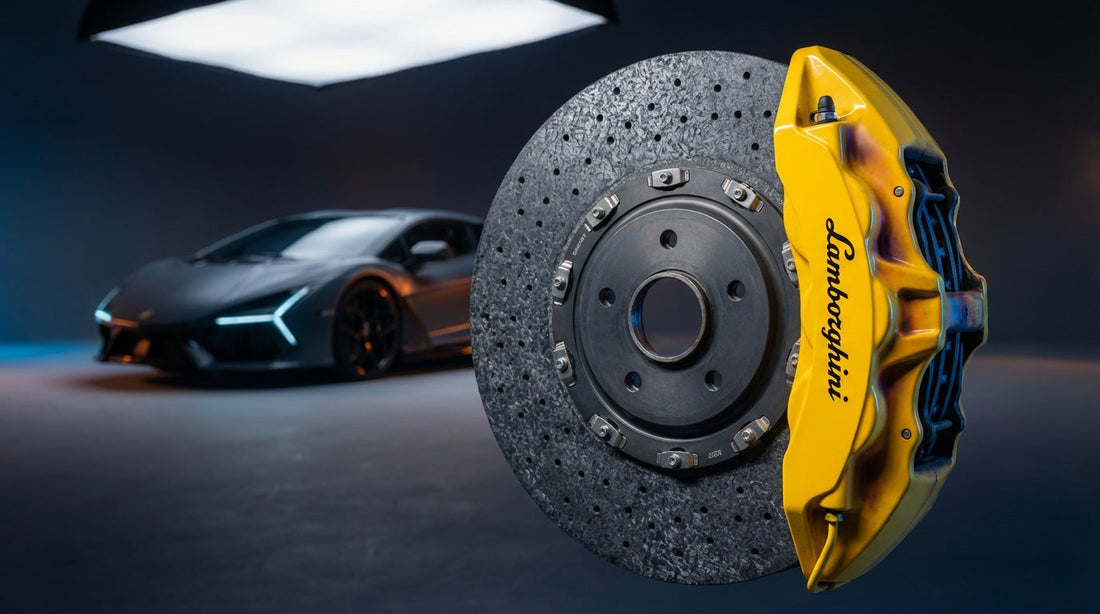 Close-up of a Lamborghini carbon ceramic brake rotor and yellow caliper showcasing high-performance braking technology for Urus, Huracan, and Revuelto models.