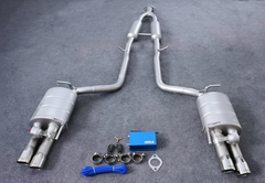 Car exhaust system with accessories on a gray surface