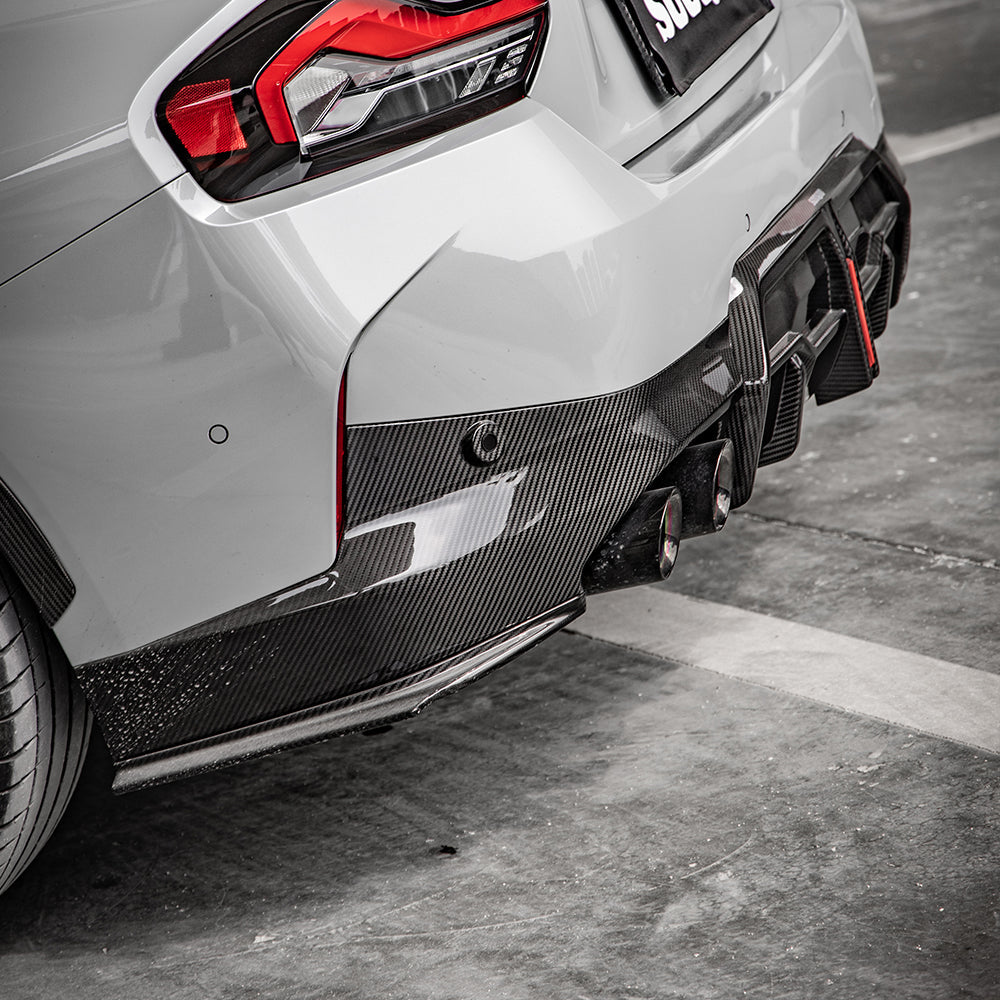 SOOQOO BMW 2 Series G42 carbon fibre rear diffuser - close-up of carbon fibre weave detail