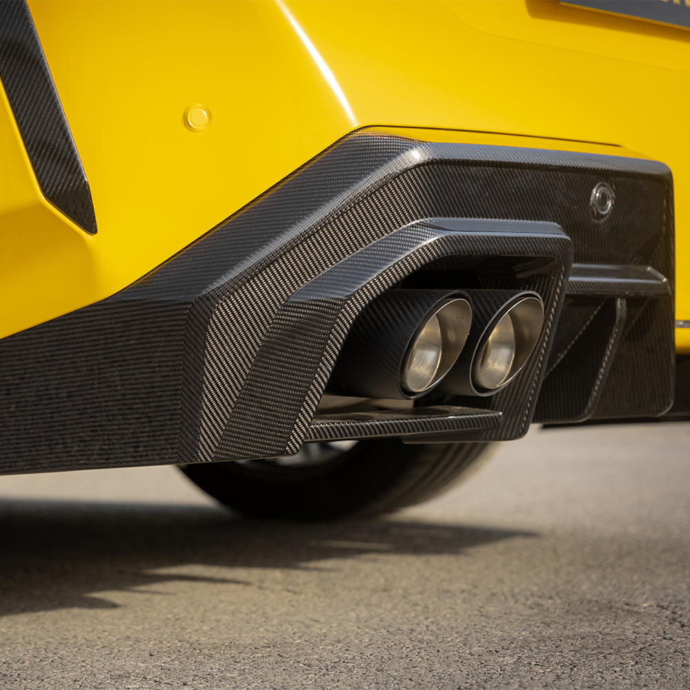 SOOQOO BMW M5 G90 carbon fibre rear diffuser - rear three-quarter view