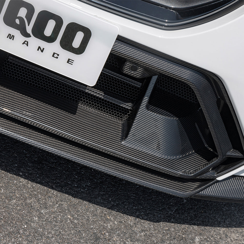 SOOQOO BMW M5 G90 carbon fibre front bumper trim - rear three-quarter view
