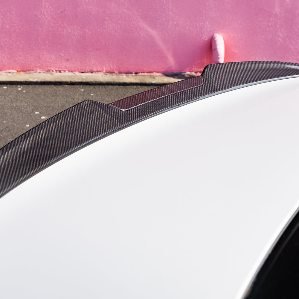 SOOQOO BMW M5 G90 carbon fibre spoiler - rear three-quarter view