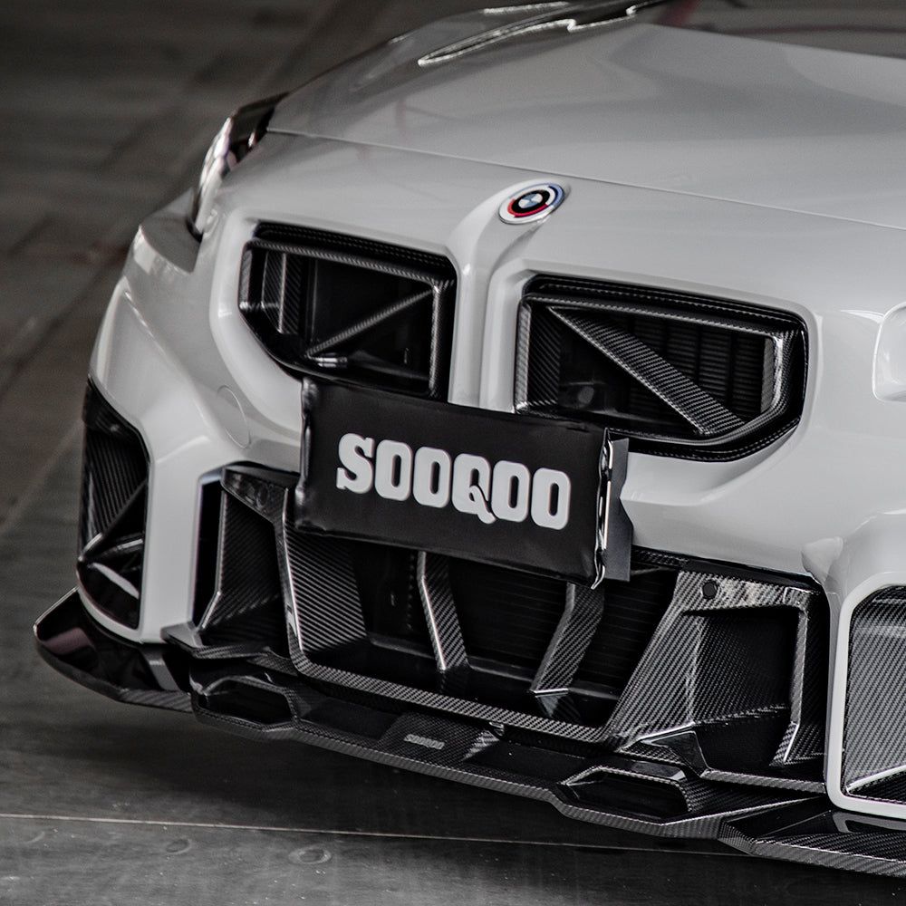 SOOQOO BMW M2 G87 carbon fibre front splitter - top-down view showing panel alignment