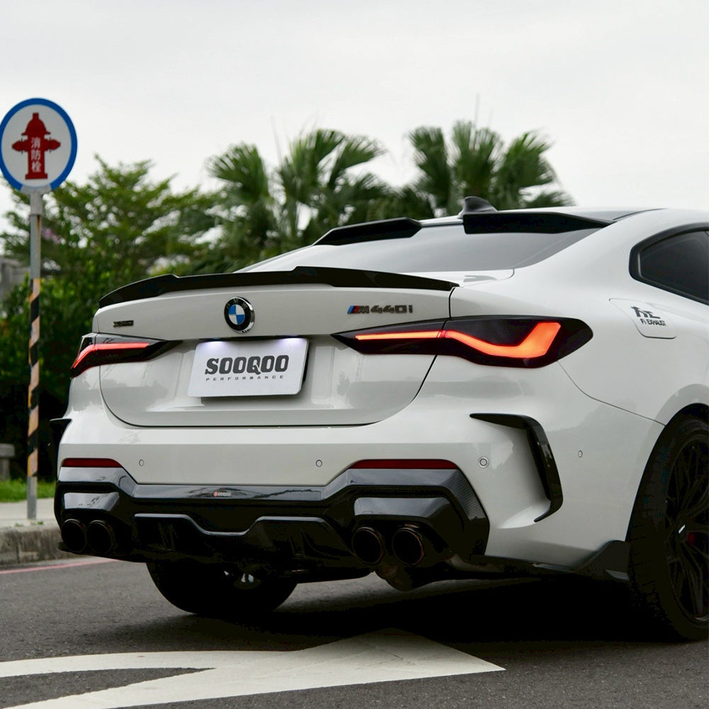 SOOQOO BMW M4 G82 carbon fibre spoiler - full vehicle shot with part installed