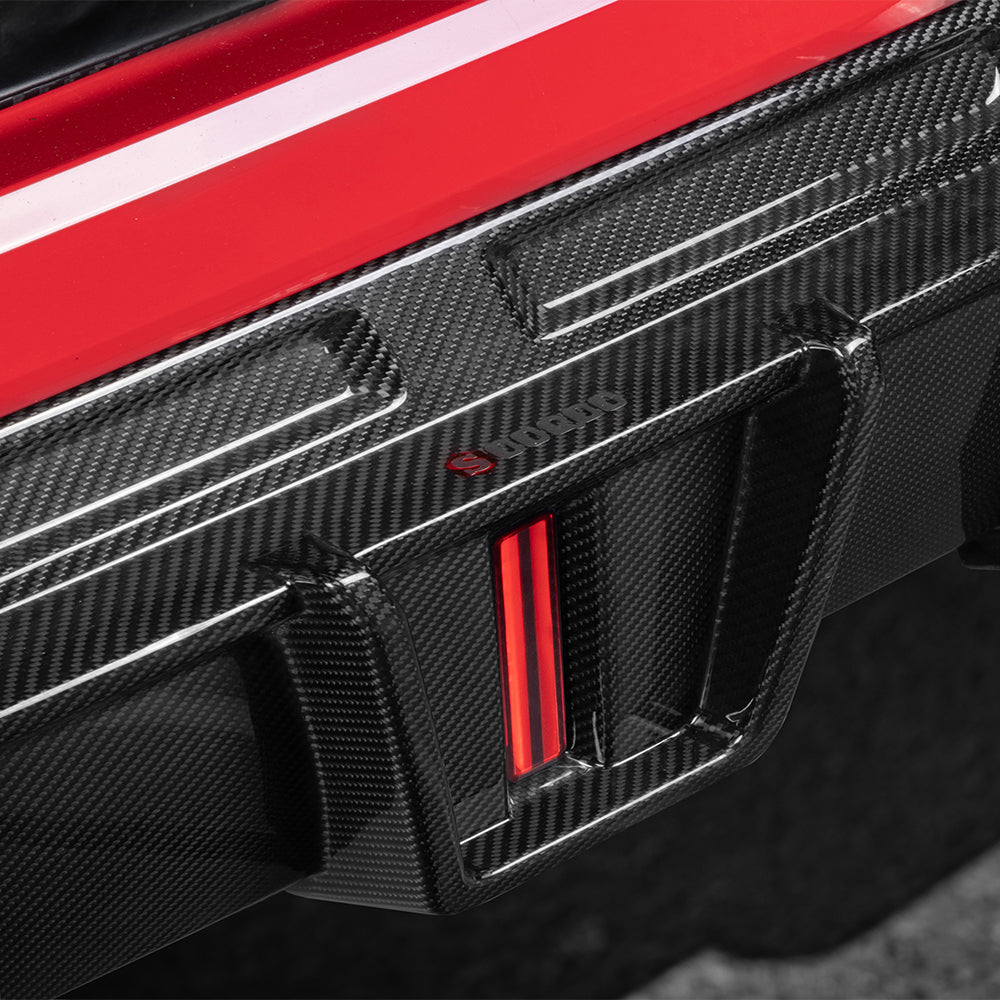 SOOQOO BMW X6M F96 carbon fibre rear diffuser - top-down view showing panel alignment
