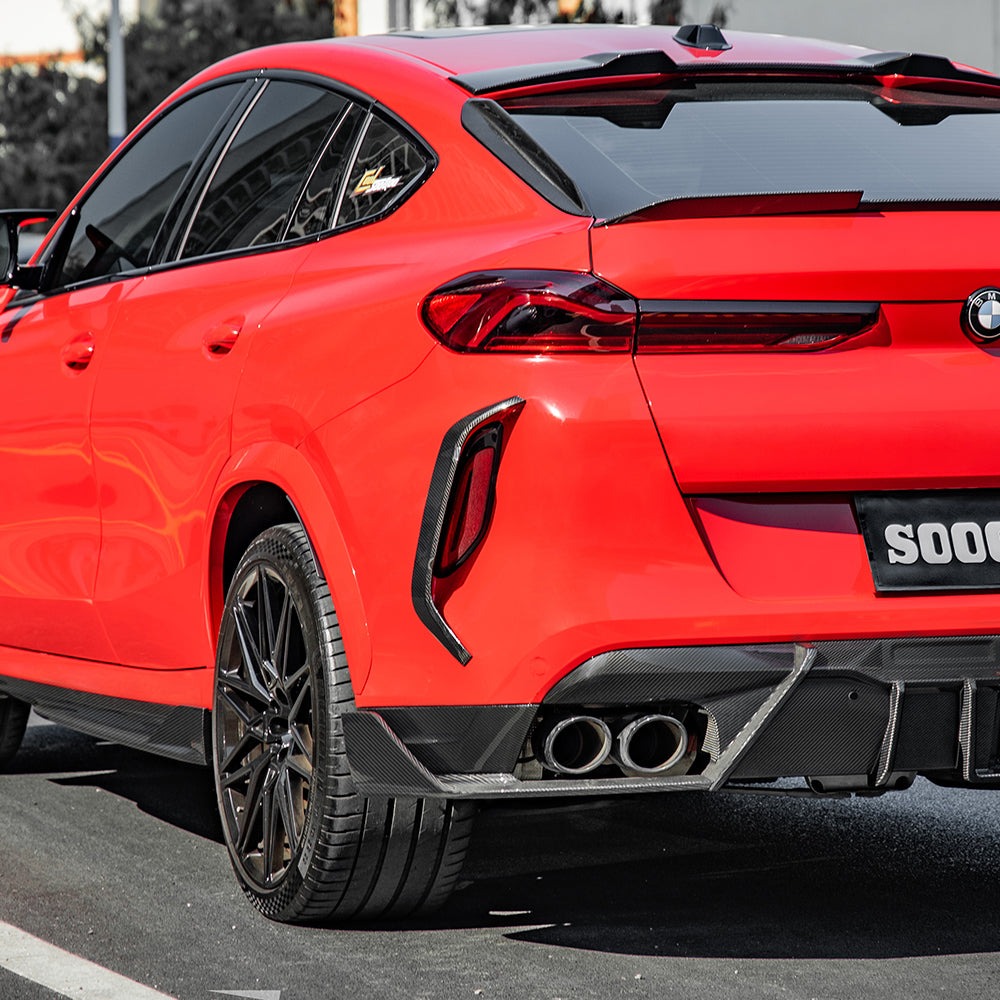 SOOQOO BMW X6M F96 carbon fibre rear vent trim - rear three-quarter view