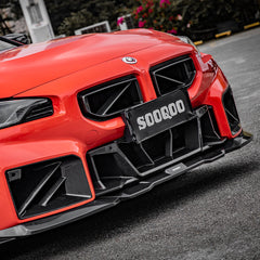 SOOQOO BMW M2 G87 carbon fibre front bumper trim - rear three-quarter view