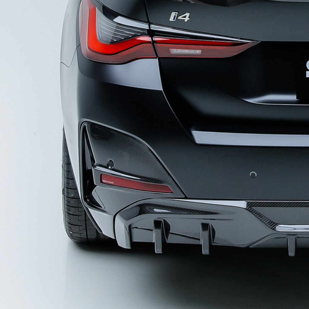 SOOQOO BMW 4 Series G26 carbon fibre rear diffuser - rear three-quarter view