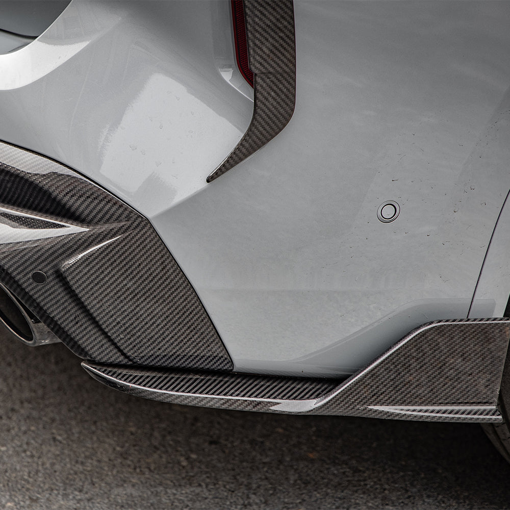 SOOQOO BMW X3M F97 carbon fibre rear diffuser - rear three-quarter view