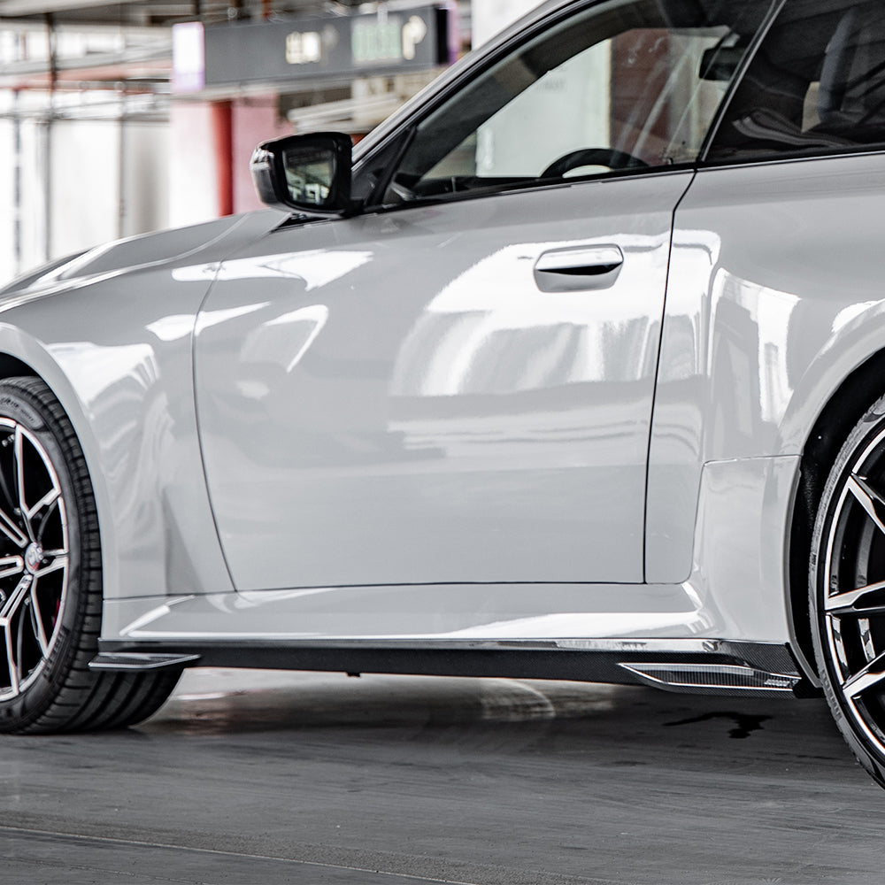 SOOQOO BMW M2 G87 carbon fibre side skirt - full vehicle shot with part installed