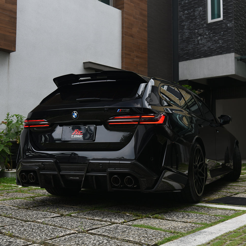 SOOQOO BMW M5 G99 carbon fibre spoiler - full vehicle shot with part installed