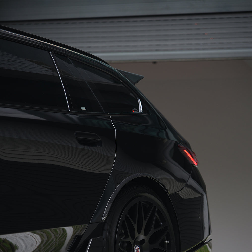SOOQOO BMW M5 G99 carbon fibre spoiler - rear three-quarter view