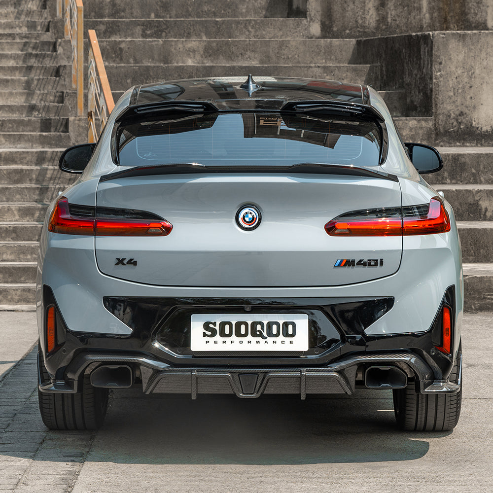 SOOQOO BMW X4 G02 carbon fibre rear diffuser - rear three-quarter view