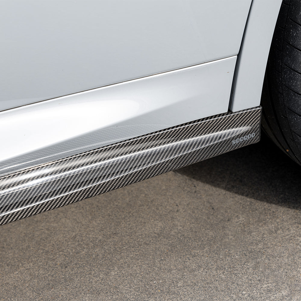SOOQOO BMW X3M F97 carbon fibre side skirt - full vehicle shot with part installed