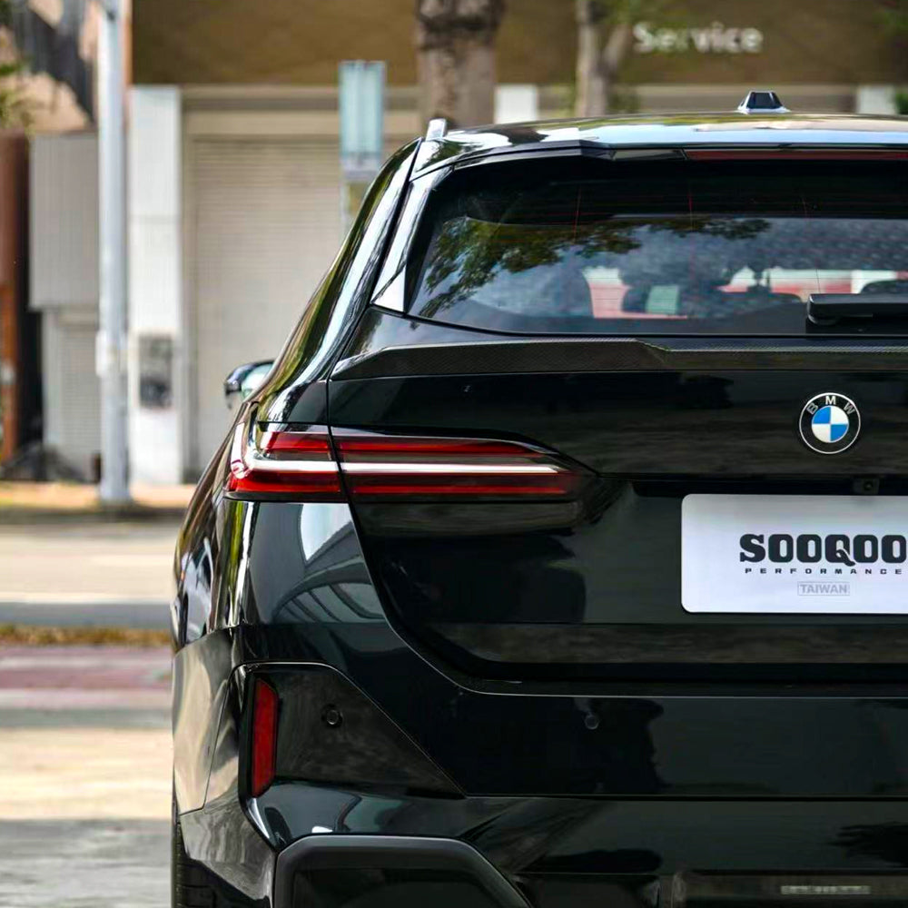 SOOQOO BMW M5 G99 carbon fibre spoiler - full vehicle shot with part installed